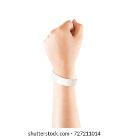 Blank white paper wristband mock up on persons arm. Empty event wrist band design mockup on hand. Cheap bracelets template, isolated. Clear adhesive bangle wristlet with sticker. Concert armlet
