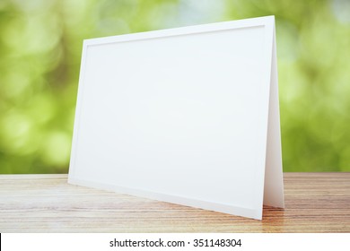 Blank White Postcard On Wooden Table Outdoor, Mock Up