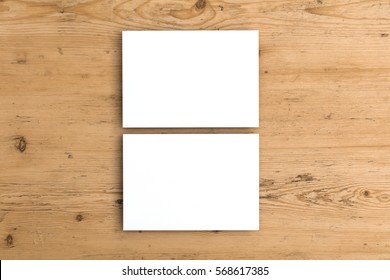 Blank White Postcard On A Wooden Background