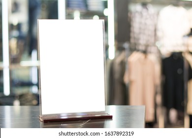 Blank White Price Tag Clothing Store On Desk In Shop