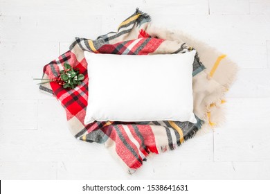 Blank White Rectangle Pillow Laying On Christmas Blanket And White Wood Background, Christmas Pillow Mockup