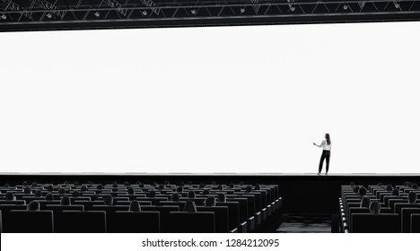 Blank White Screen In Presentation Hall Person On Stage Mockup. Empty Scren In Theatre Mock Up. People On Lecture Or Movie Premiere Template. Education Event With Viewers.