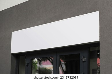 Blank white shop sign mockup, large billboard banner on a storefront mock up template.
