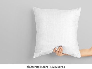 Blank White Square Pillow Mockup Holding By Woman Hand