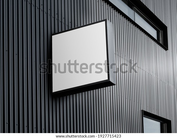 Blank White Square Store Signboard.\
Illuminated Lightbox on a Black Corrugated\
Wall