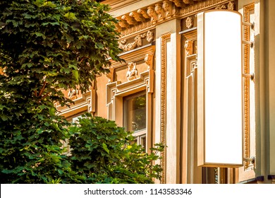 Blank White Vertical Banner On Building Facade, Design Mockup. Empty Flag Mock Up On The Side Of Hotel Exterior