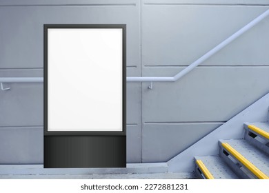 Blank white vertical digital display in front of painted concrete wall, beside flight of stairs. Template for mock up of advertising poster.