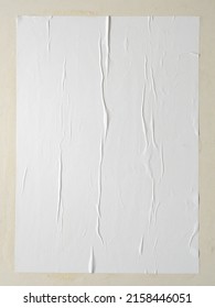 Blank white wheatpaste glued paper poster mockup on white wall background