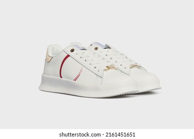 Blank White women's basketball tennis sneakers, sports shoes, boots for female isolated on white background. Footwear, pair of casual leather training shoes. Template, mock up