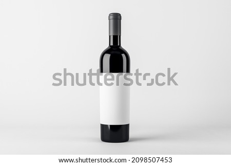 Blank wine botte with mock up place on white background. Product, alcohol, beverage and advertisement concept. 3D Rendering