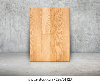 Blank Wood Block Frame Leaning At Grunge Grey Concrete Wall And Floor, Mock Up Template For Adding Your Design