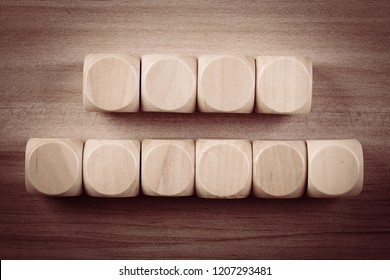 Blank Wooden Cube Blocks On The Table.