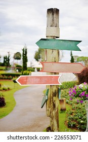 blank wooden direction signpost