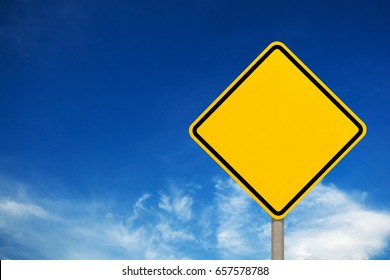 Blank yellow road sign or Empty traffic signs on the blue sky background
