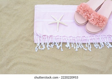 Blanket, Stylish Slippers And Starfish On Sand Outdoors, Top View With Space For Text. Beach Accessories