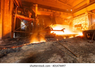 Blast furnace smelting liquid steel in steel mills - Shutterstock ID 401474497