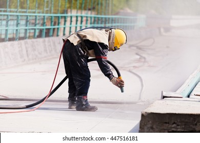 blasting of concrete, note shallow depth of field