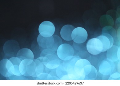 Blau Bokeh Wallpaper .Festive Christmas Background. Glowing Blau Bokeh. .Beautiful Bokeh Background In Blau Colors.Abstract Trendy Background.