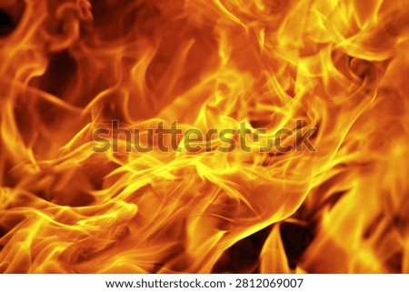 Blazing Fire Flames Background Texture. Dynamic Orange and Yellow Hues, Abstract Heat and Energy Concept.