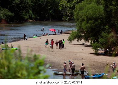 With Blazing Hot Temperatures And Low Water Levels Groups Of People Go Swimming In The Wolf River To Escape The Heat Wave In Memphis, Tennessee. On July 4th, 2022.