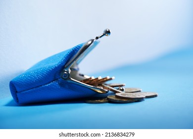 Ble Coin Purse Against Blue Background