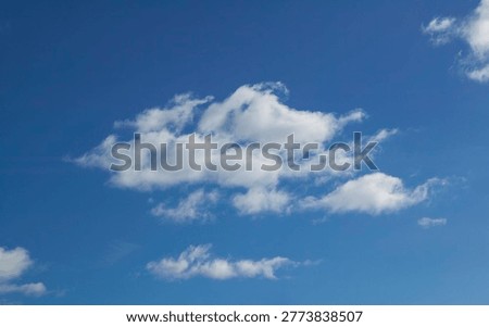 Ble sky with white clouds