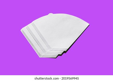 Bleached paper coffee filter isolated on violet purple background. Alternative brewing pour over v60. Minimalistic abstract background for store, shop, retail. mock up, top view, place for text - Shutterstock ID 2019569945