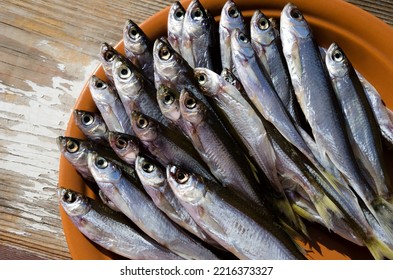 Bleak Or Shemaya. Dried Fish On A Ceramic Plate. Very Tasty, Oily Fish For Beer.