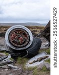 Bleaklow crash site, Peak District. Features the wreckage of a USAF B-29 Superfortress from 1948. A poignant memorial in a rugged, windswept landscape, popular with hikers and history enthusiasts.