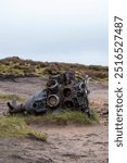 Bleaklow crash site, Peak District. Features the wreckage of a USAF B-29 Superfortress from 1948. A poignant memorial in a rugged, windswept landscape, popular with hikers and history enthusiasts.