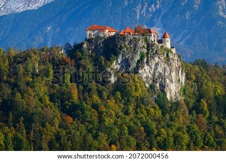 Bled Castle built on top of a cliff overlooking lake Bled, located in Bled, Slovenia, Europe                               