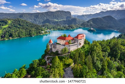 Bled, Slovenia - Aerial panoramic view of beautiful Bled Castle (Blejski Grad) with Lake Bled (Blejsko Jezero), the Church of the Assumption of Maria and Julian Alps at background on a nice summer day