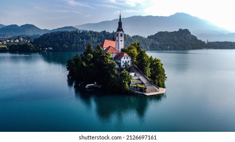 Bled Slovenia Lake. Beautiful mountain lake with small pilgrimage church. The most famous Slovenian lake and the island of Bled with the pilgrimage church of Maria. Aerial view of Lake Bled. 