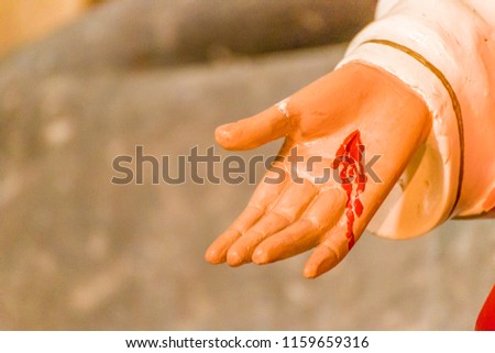 bleeding stigmata in welcoming hand