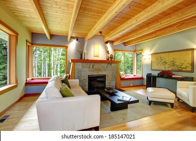 Blend Of Log Cabin Interior With Elegant Black And White Furniture.