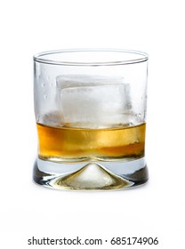 Blended Scotch Whiskey Served In A Short Glass With A Large Ice Cube Isolated On A White Background