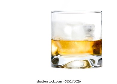 Blended Scotch Whiskey Served In A Short Glass With A Large Ice Cube Isolated On A White Background