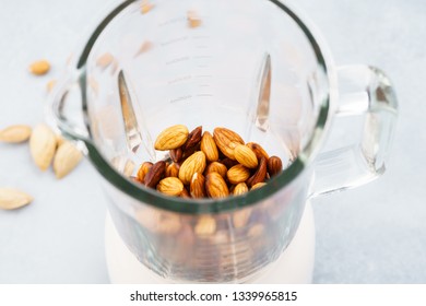 Blender With Soaked Almonds For Making Nut Milk. Dairy Free, No Lactose Vegan Milk. Step By Step Recipe.