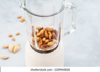 Blender With Soaked Almonds For Making Nut Milk. Dairy Free, No Lactose Vegan Milk. Step By Step Recipe.