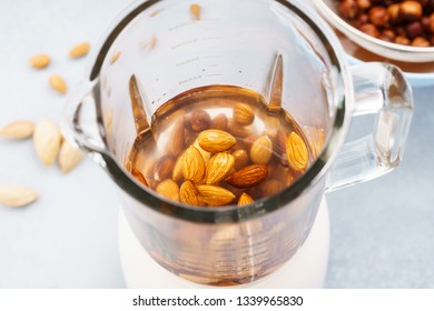 Blender With Soaked Almonds For Making Nut Milk. Dairy Free, No Lactose Vegan Milk.