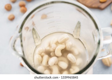 Blender With Soaked Cashews For Making Nut Milk. Dairy Free, No Lactose Vegan Milk.