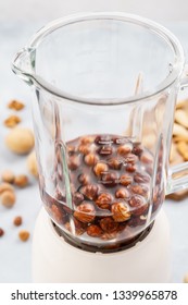 Blender With Soaked Hazelnuts For Making Nut Milk. Dairy Free, No Lactose Vegan Milk. Step By Step Recipe.