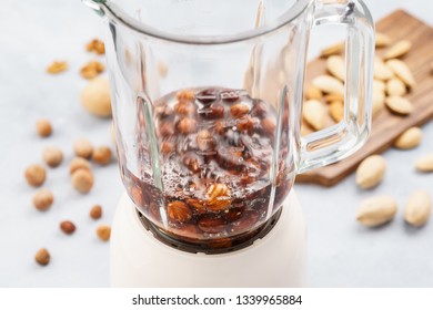 Blender With Soaked Hazelnuts For Making Nut Milk. Dairy Free, No Lactose Vegan Milk. Step By Step Recipe.