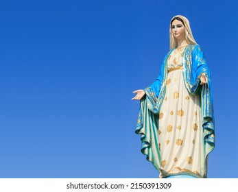 The blessed holy women Lady of Lourdes, grace virgin mother mary roman catholic statue figure. Church steadily religious pilgrimage mother Jesus. devotion our Lady of Marian Miracles. with copy space.
