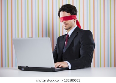 Blind Businessman Working At The Office