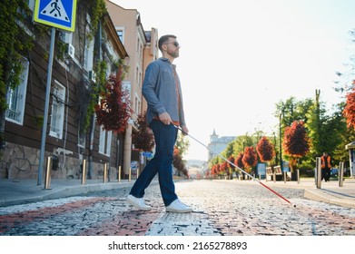 Blind Man. Visually Impaired Man With Walking Stick