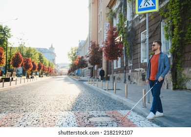 Blind Man. Visually Impaired Man With Walking Stick