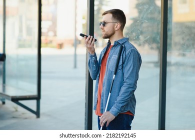 Blind Man. Visually Impaired Man With Walking Stick