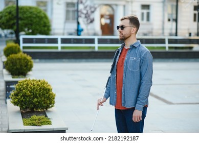 Blind Man. Visually Impaired Man With Walking Stick