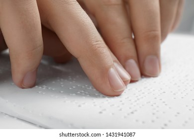 Blind Person Reading Book Written In Braille, Closeup